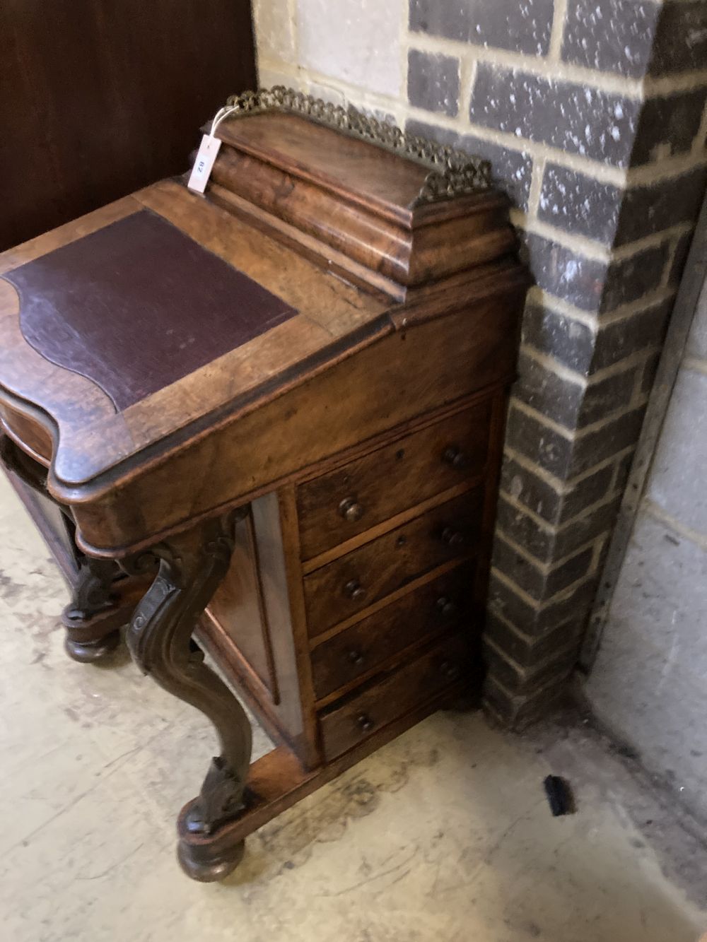 A Victorian walnut serpentine front davenport, width 54cm depth 54cm height 88cm